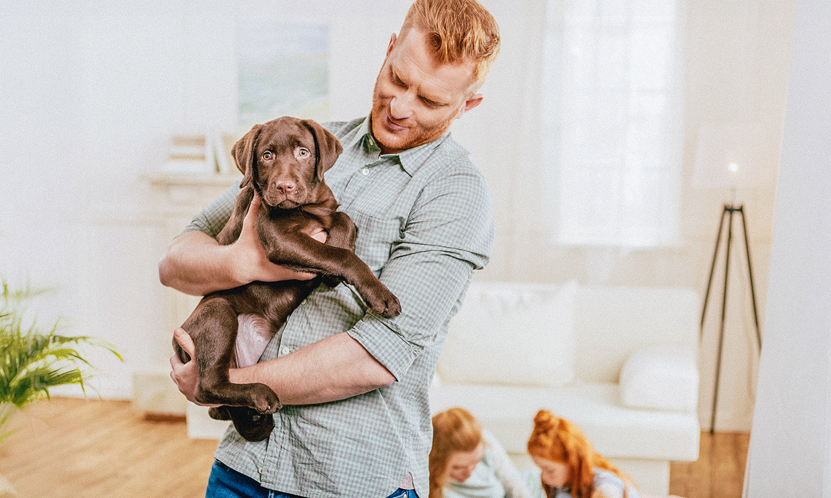 Man with Labrador Retriever